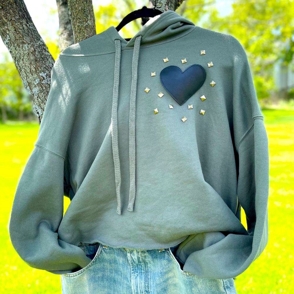 Cropped hoodie with leather heart and brass studs